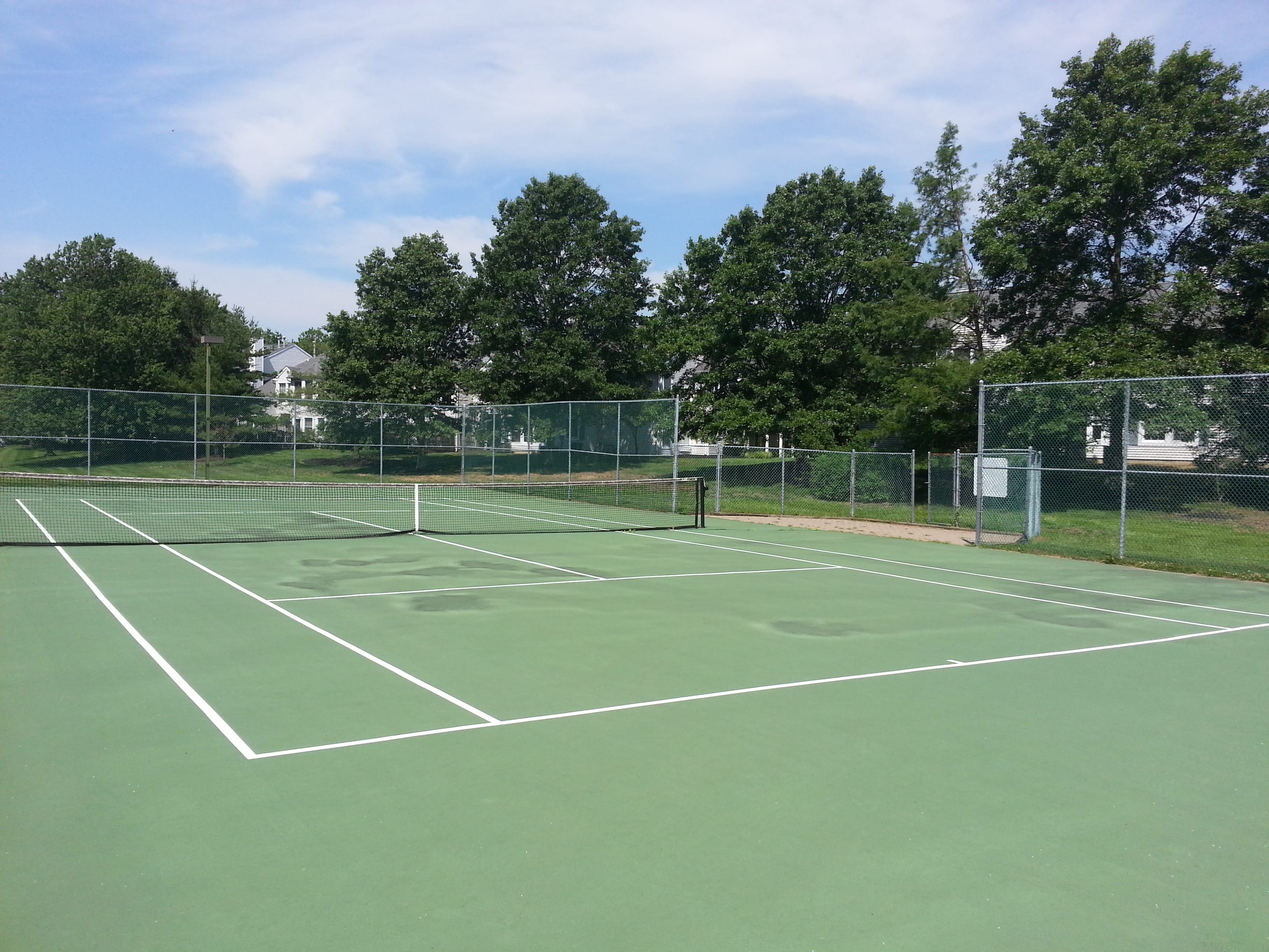 This tennis court is among the amenities at the Villas at Poplar Brook in Ocean Twp.