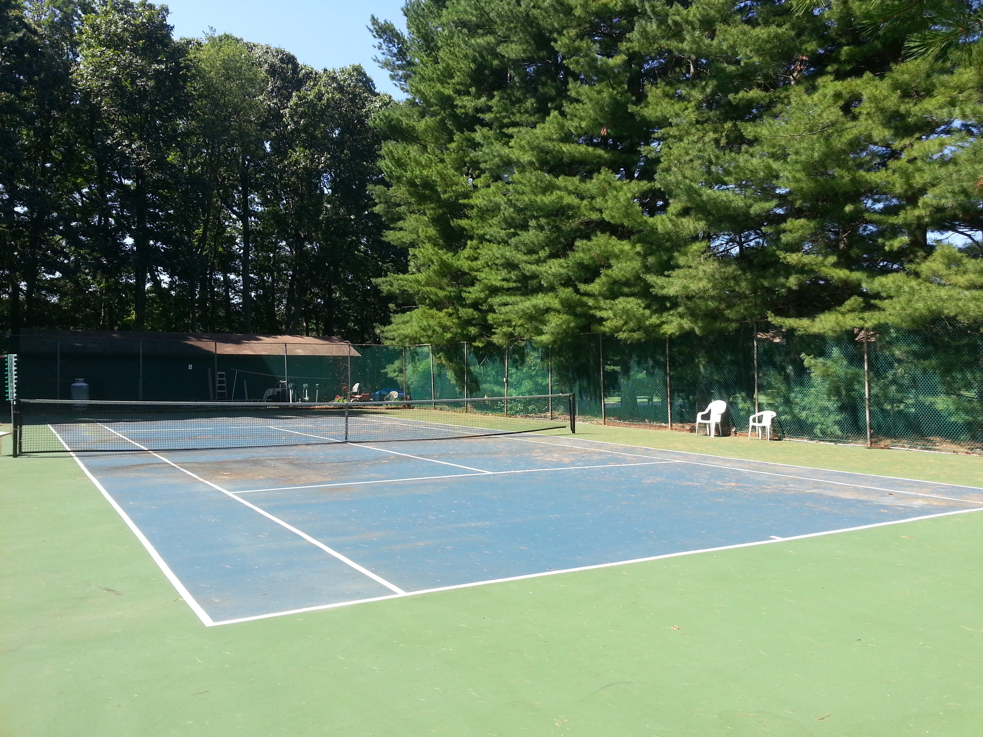 Shadow Lake Village has two tennis courts, pictured here, located near the clubhouse and pool.